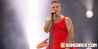 robbie williams breaks the rules with early ‘britpop’ drop — uk chart record in sight